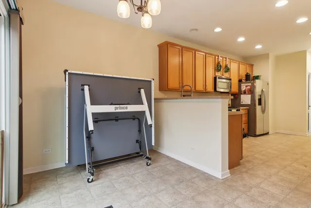 a view of a kitchen with a sink
