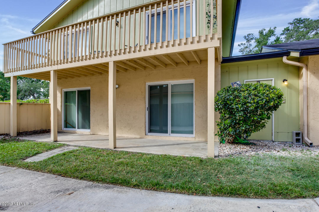 11366 Harts Road Jacksonville, FL 32218 - Photo 21 of 23 front view of a house with a yard