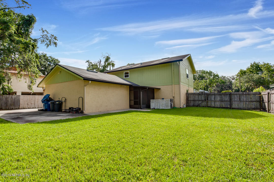 11366 Harts Road Jacksonville, FL 32218 - Photo 23 of 23 a house view with swimming pool in front of it