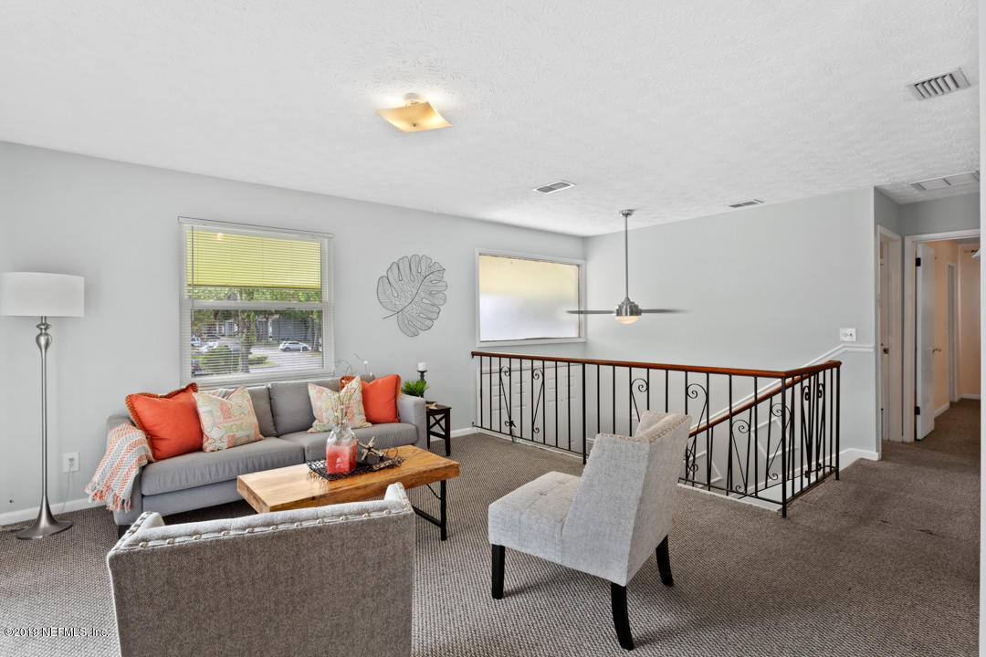 11366 Harts Road Jacksonville, FL 32218 - Photo 6 of 23 a living room with furniture and a window