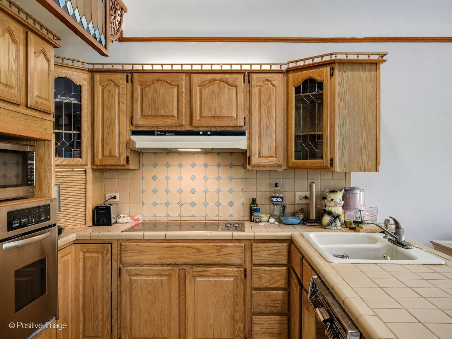 33 East Division Street Chicago, IL 60611 - Photo 26 of 34 a kitchen with stainless steel appliances granite countertop a sink and cabinets