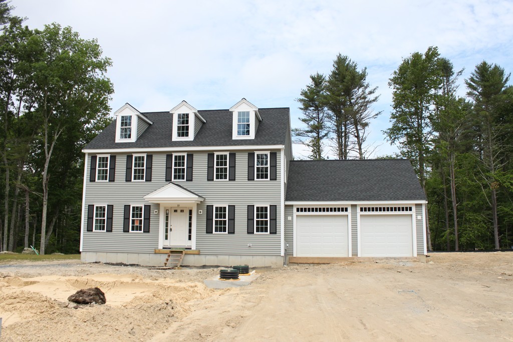 10 Stony Point Road Middleboro, MA 02346 - Photo 3 of 17 a view of a yard in front of a white house