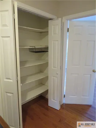 a bathroom with a shower and a toilet