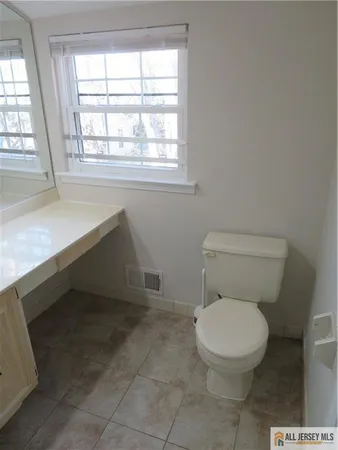 a bathroom with a bath tub