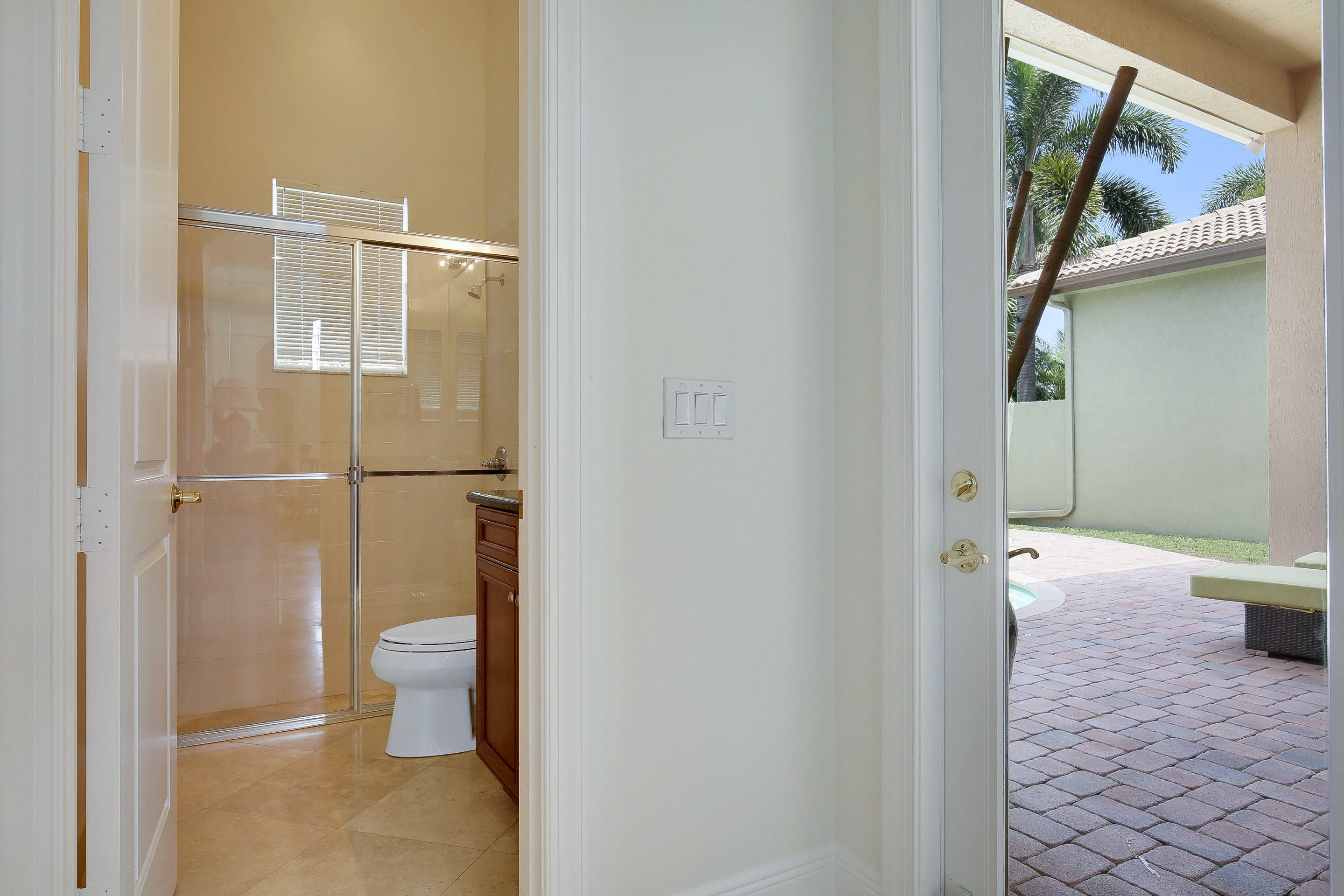 8173 Valhalla Drive Delray Beach, FL 33446 - Photo 29 of 59 CABANA BATH - DOOR TO THE POOL