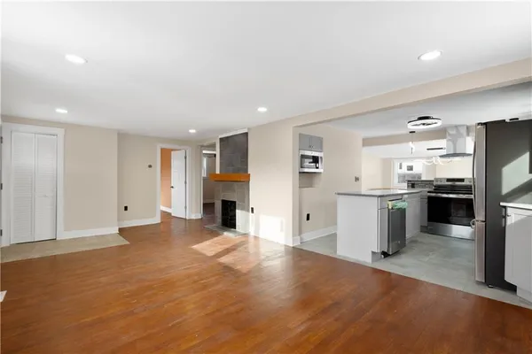 a view of a kitchen with a sink