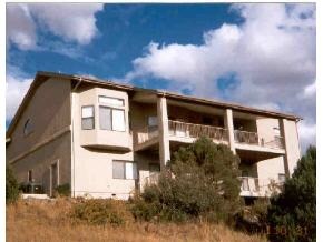 528 Miracle Rider Road, Unit YAV Prescott, AZ 86301 - Photo 2 of 10 a front view of house with yard
