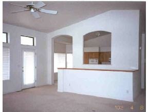 528 Miracle Rider Road, Unit YAV Prescott, AZ 86301 - Photo 4 of 10 a view of an empty room with a window