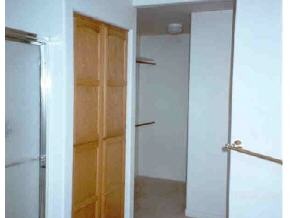 528 Miracle Rider Road, Unit YAV Prescott, AZ 86301 - Photo 9 of 10 a bathroom with a glass shower door