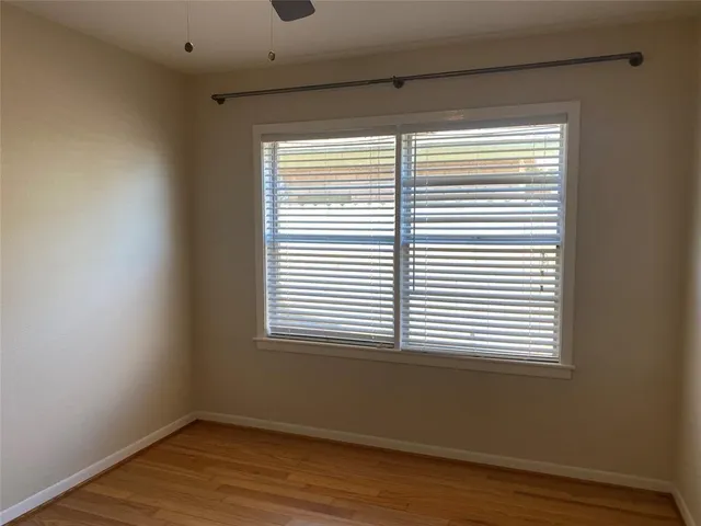 a view of a room that has a window in it