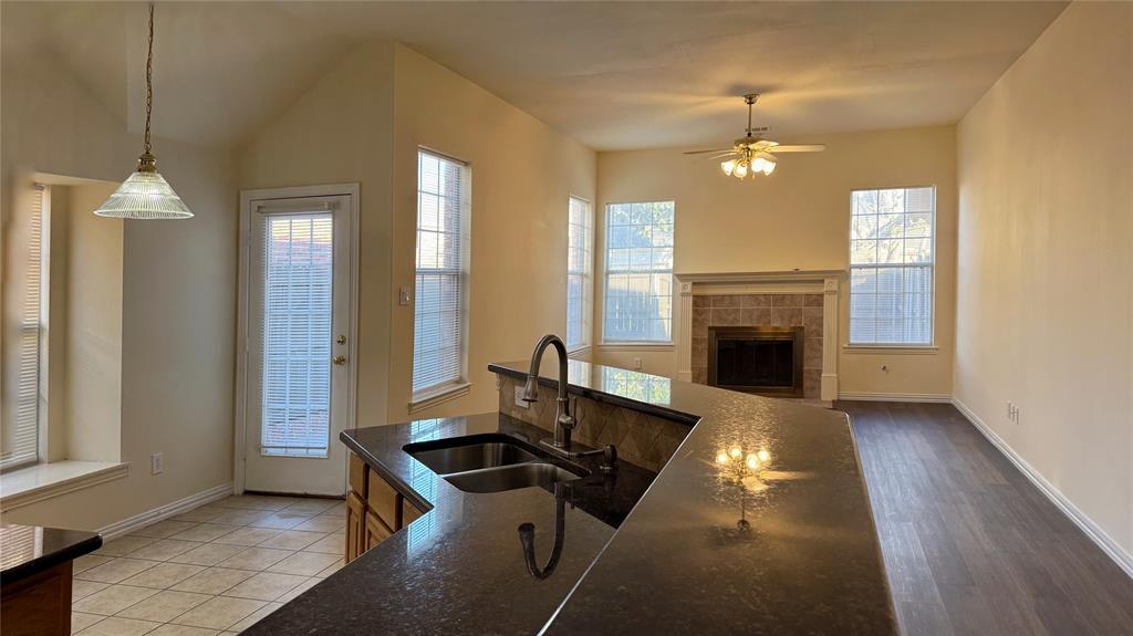 405 Colony Drive Allen, TX 75013 - Photo 11 of 17 a view of a livingroom with furniture and a fireplace