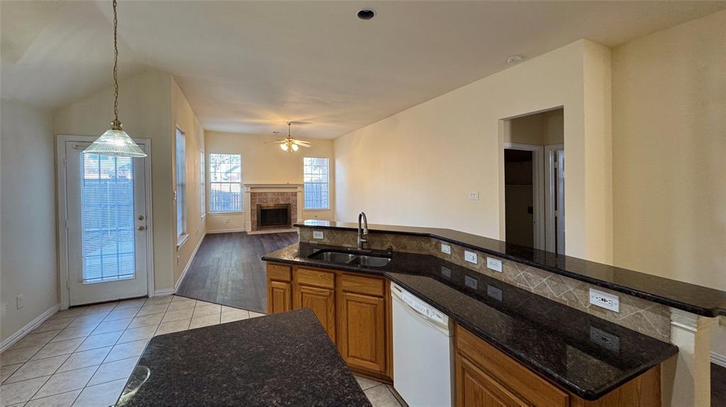 405 Colony Drive Allen, TX 75013 - Photo 3 of 17 a kitchen with a sink and stove