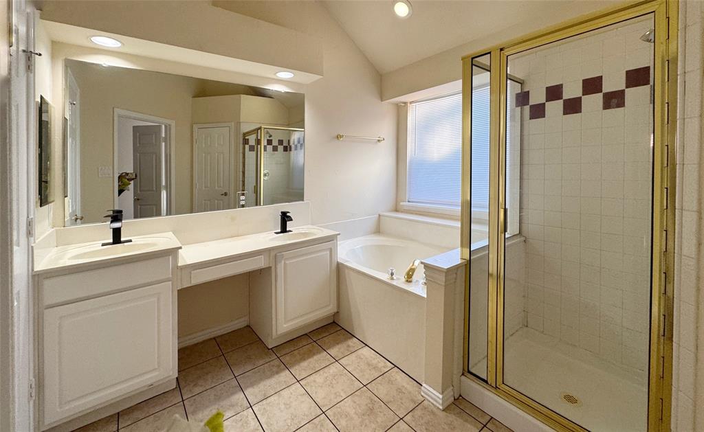 405 Colony Drive Allen, TX 75013 - Photo 6 of 17 a bathroom with a double vanity sink mirror and shower