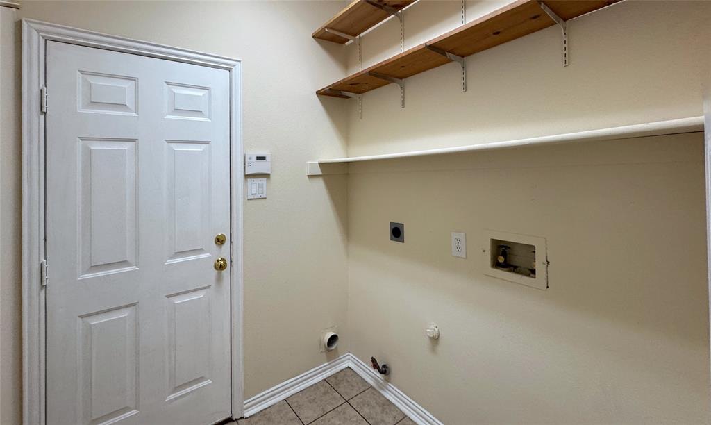 405 Colony Drive Allen, TX 75013 - Photo 8 of 17 a view of a storage & utility room in a room