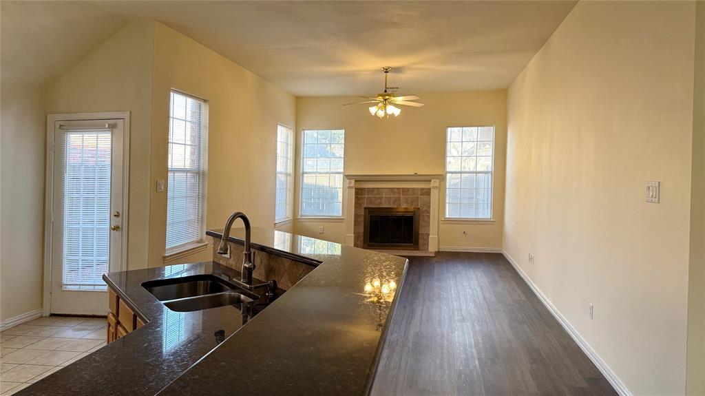 405 Colony Drive Allen, TX 75013 - Photo 10 of 17 a living room with furniture and a fireplace