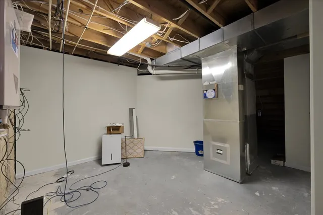 a view of a chairs and bench in the backyard