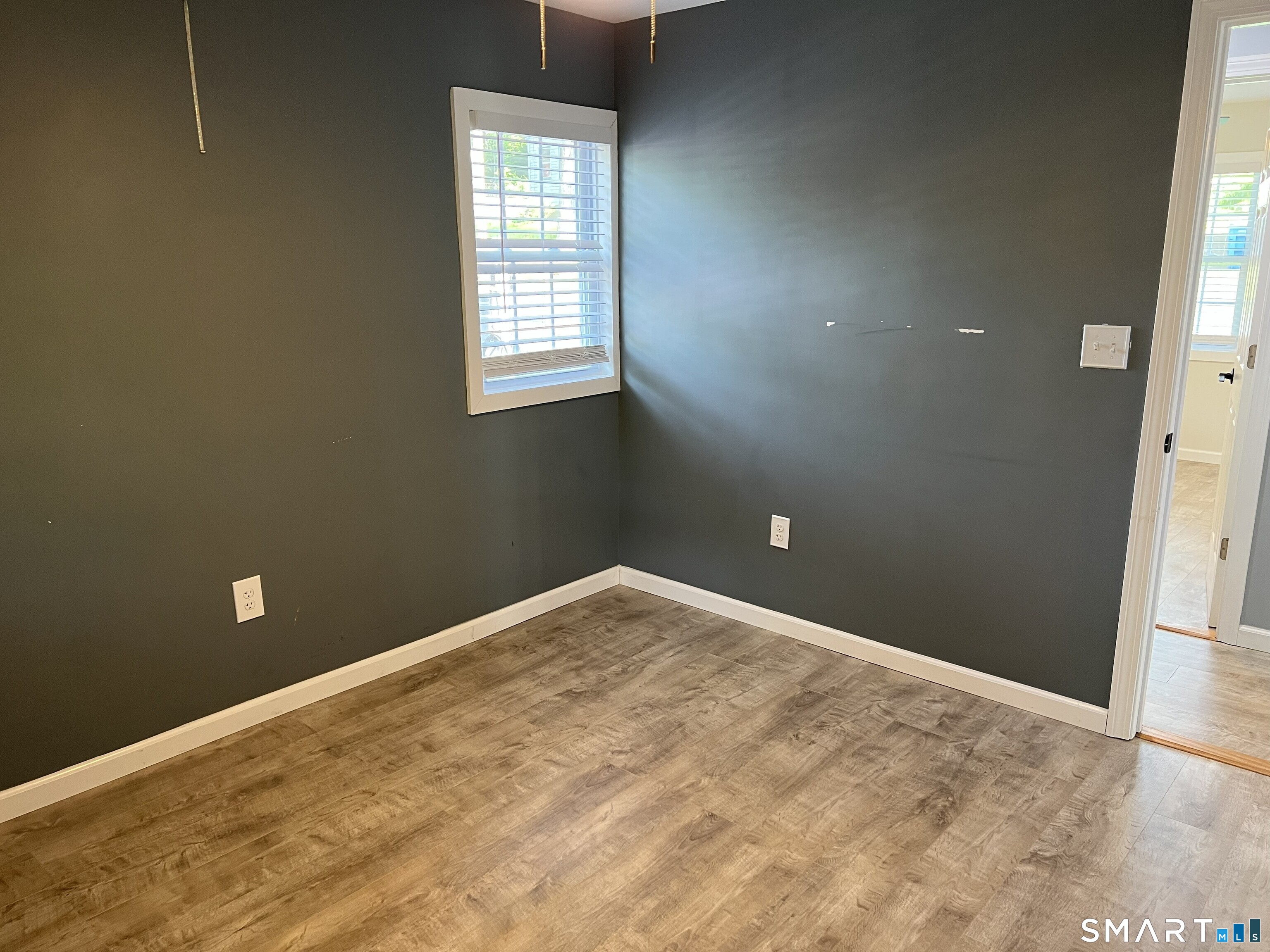 82 Bingham Street Bristol, CT 06010 - Photo 31 of 40 a view of an empty room with a window