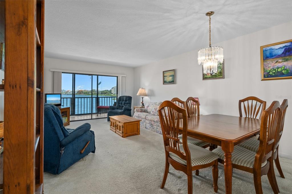 8211 Brent Street, Unit 816 Port Richey, FL 34668 - Photo 15 of 52 a view of a livingroom with furniture and a window
