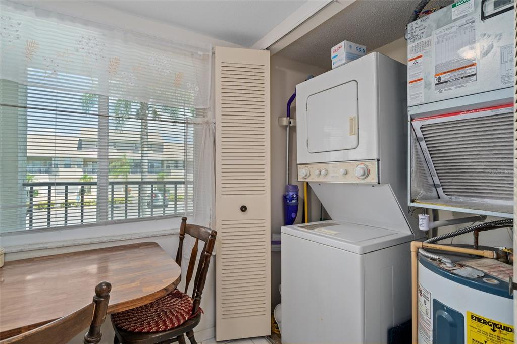 8211 Brent Street, Unit 816 Port Richey, FL 34668 - Photo 19 of 52 a view of kitchen and wooden floor