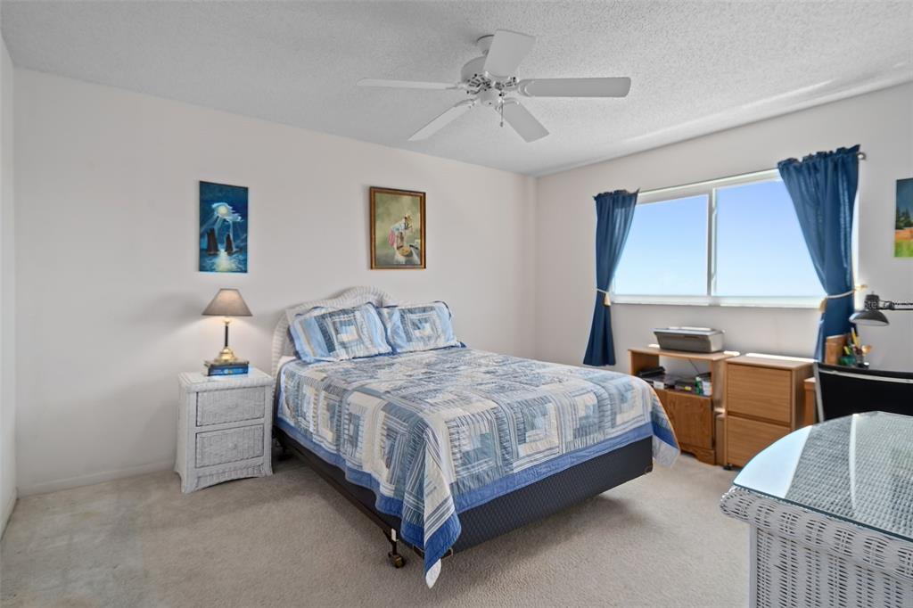 8211 Brent Street, Unit 816 Port Richey, FL 34668 - Photo 22 of 52 a bedroom with bed and window