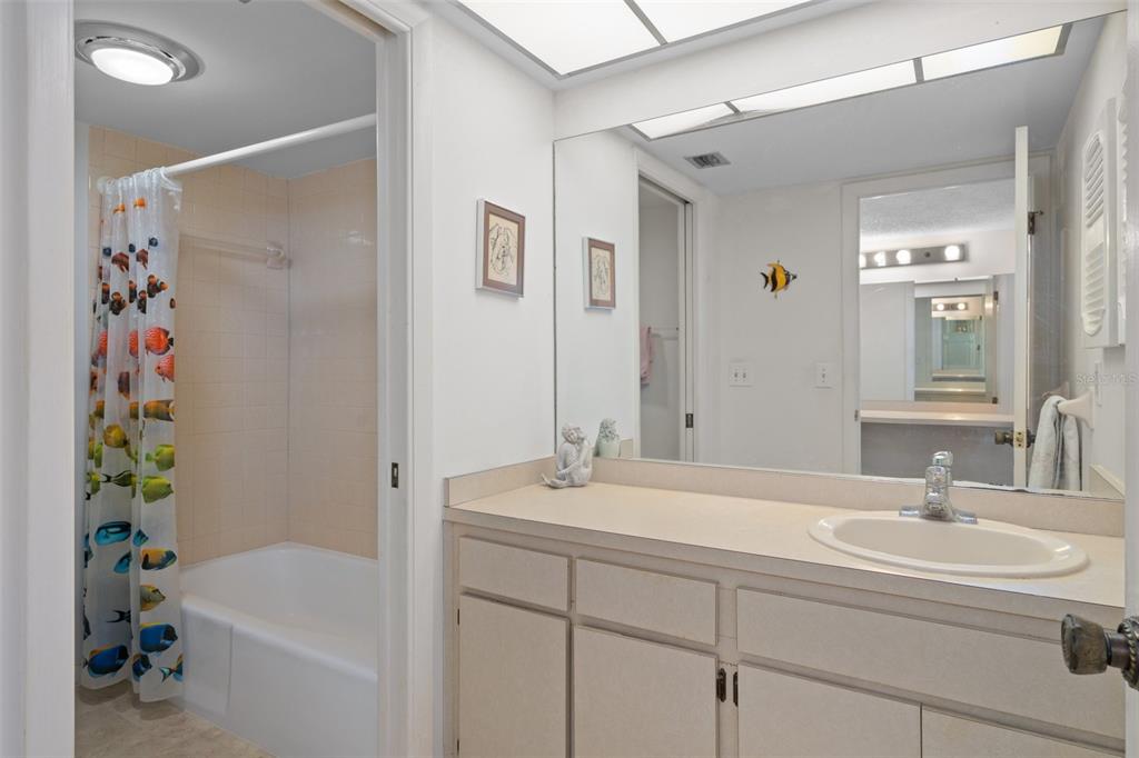 8211 Brent Street, Unit 816 Port Richey, FL 34668 - Photo 26 of 52 a bathroom with a sink a toilet and a bathtub