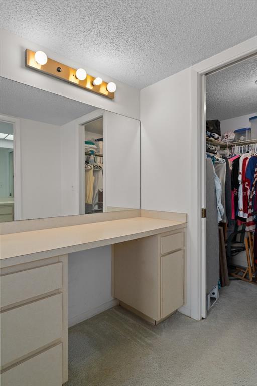 8211 Brent Street, Unit 816 Port Richey, FL 34668 - Photo 28 of 52 a bathroom with a sink and a mirror