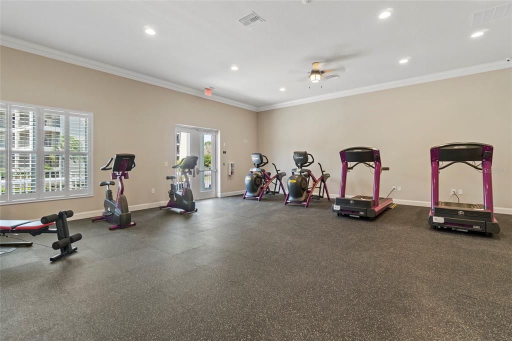 8211 Brent Street, Unit 816 Port Richey, FL 34668 - Photo 43 of 52 a view of a room with gym equipment