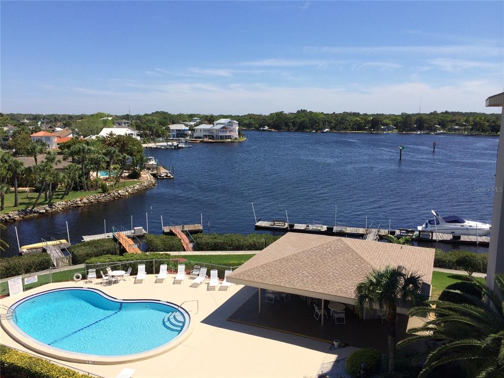 8211 Brent Street, Unit 816 Port Richey, FL 34668 - Photo 46 of 52 a view of a terrace with chairs