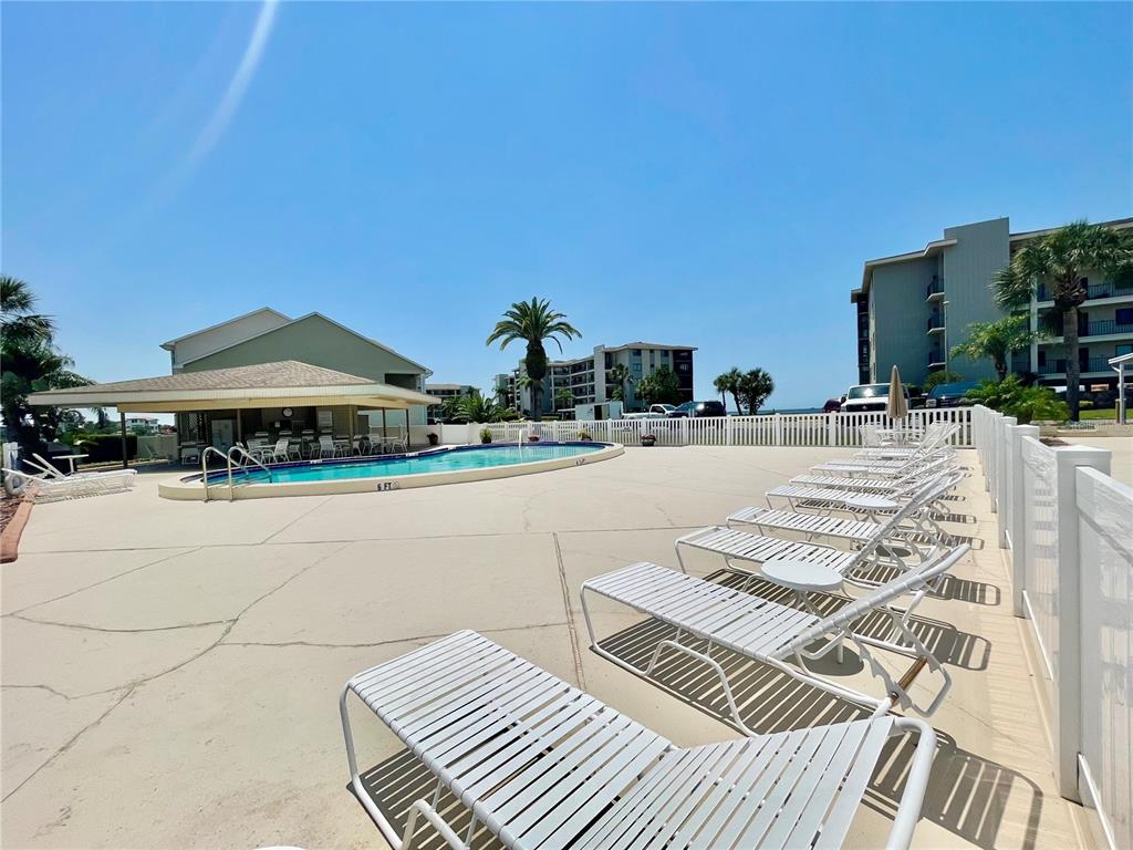 8211 Brent Street, Unit 816 Port Richey, FL 34668 - Photo 50 of 52 a view of a patio with swimming pool