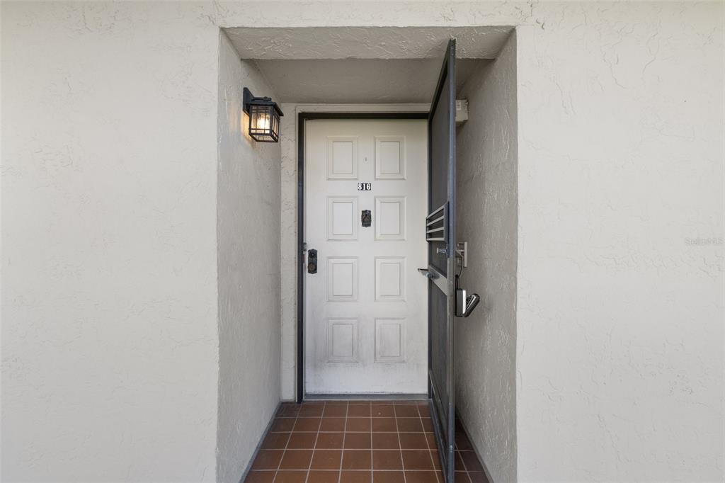 8211 Brent Street, Unit 816 Port Richey, FL 34668 - Photo 7 of 52 a view of front door