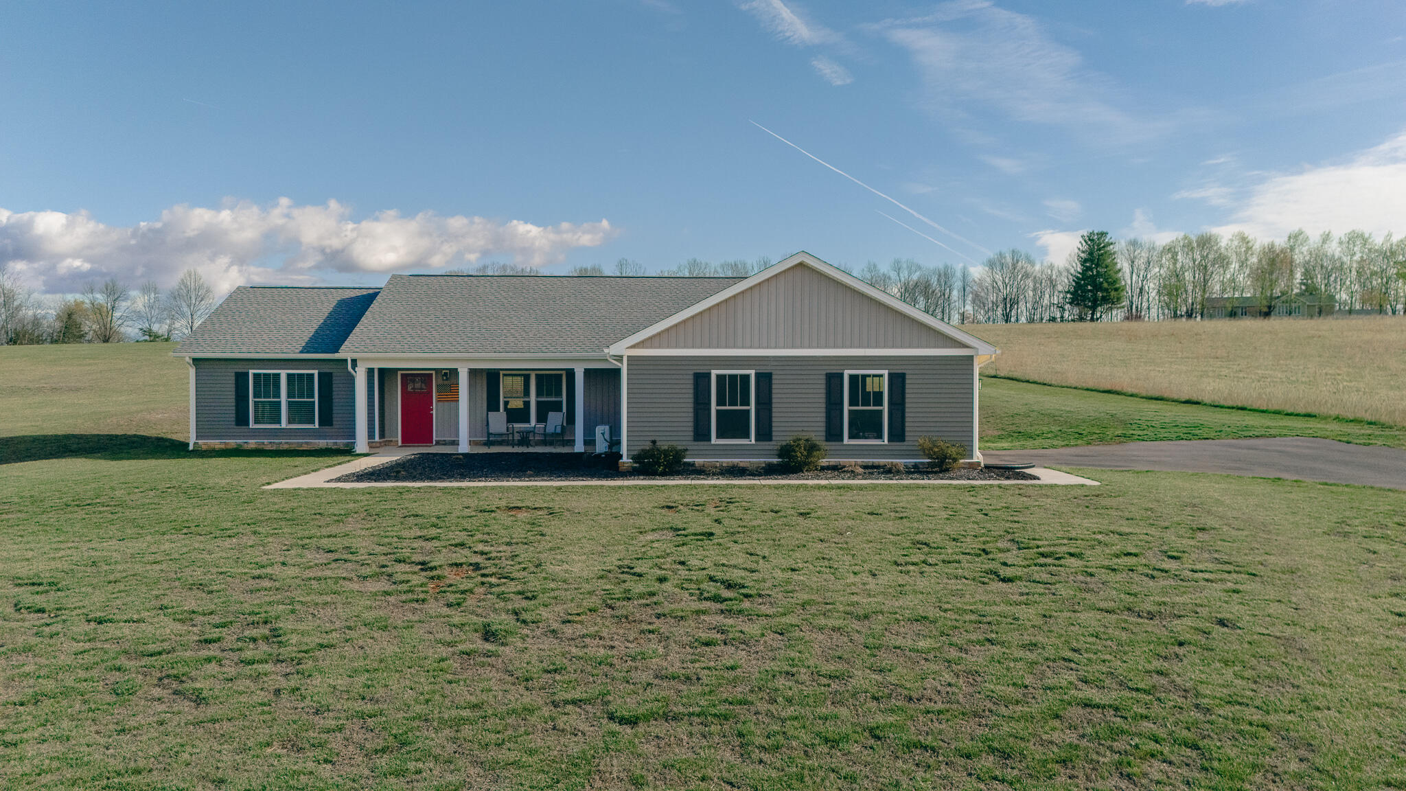 3546 Edwardsville Road Hardy, VA 24101 - Photo 1 of 29 a front view of a house with garden