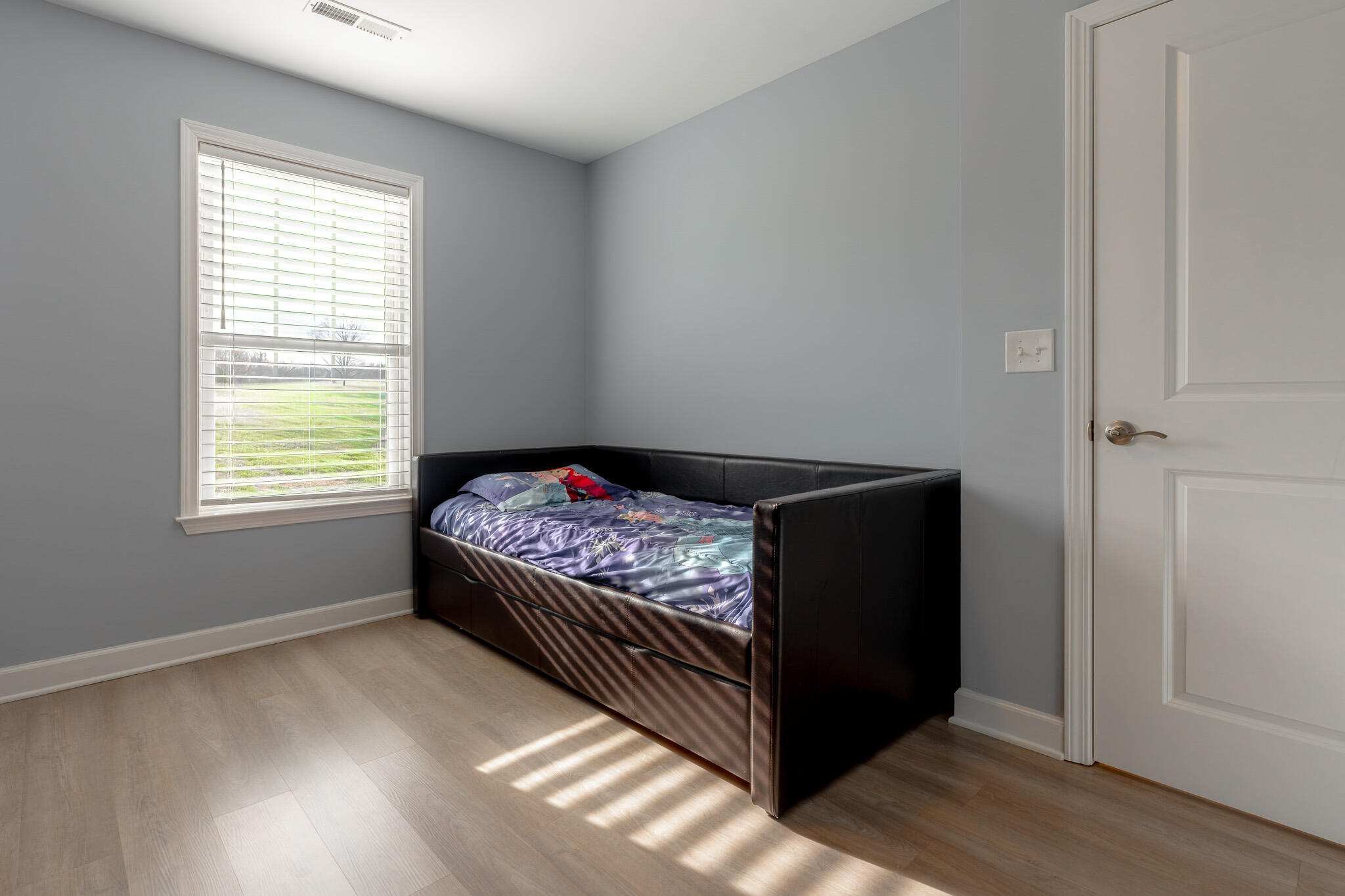 3546 Edwardsville Road Hardy, VA 24101 - Photo 13 of 29 a bedroom with a bed and wooden floor