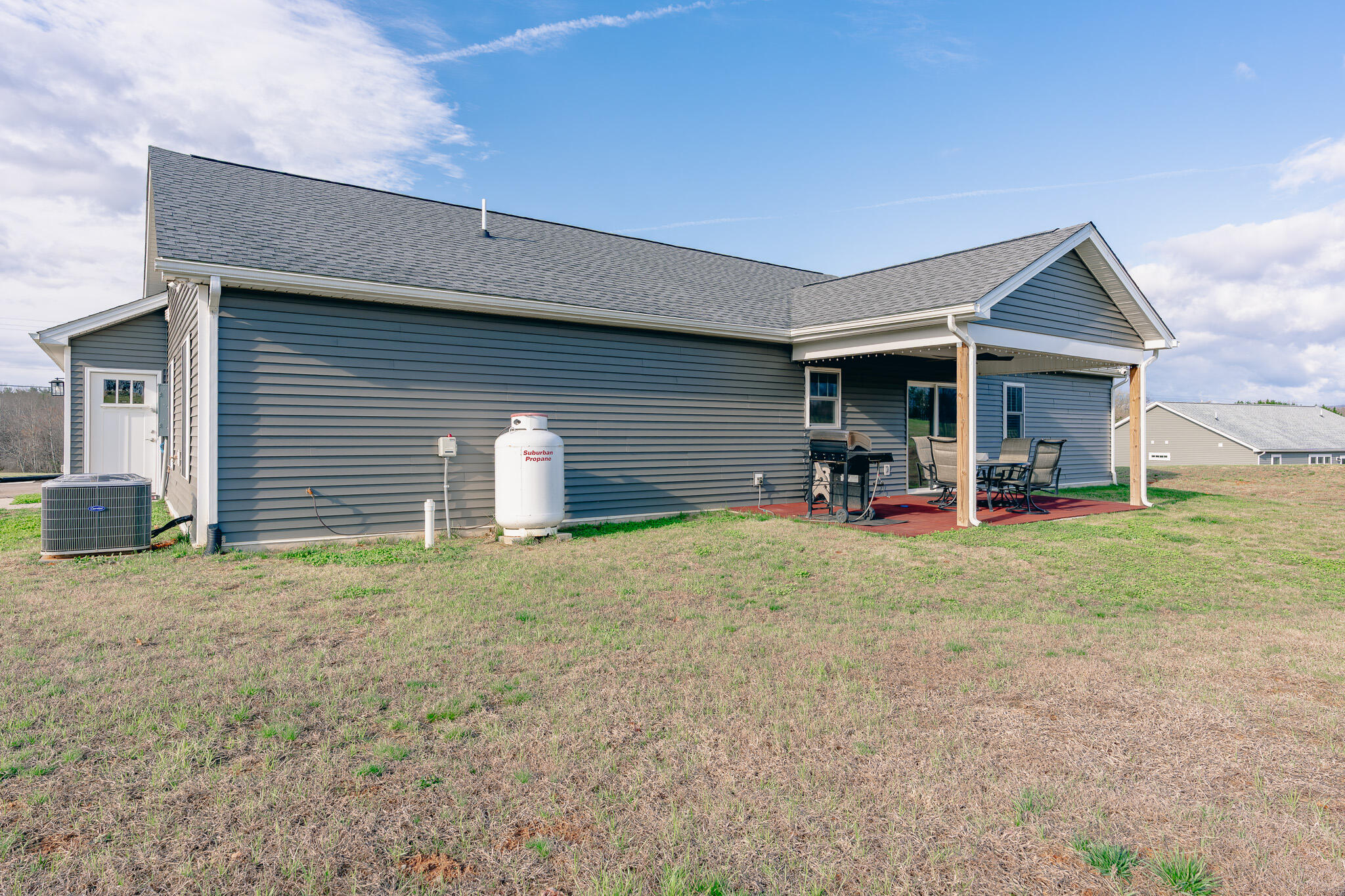 3546 Edwardsville Road Hardy, VA 24101 - Photo 20 of 29 a backyard of a house with table and chairs