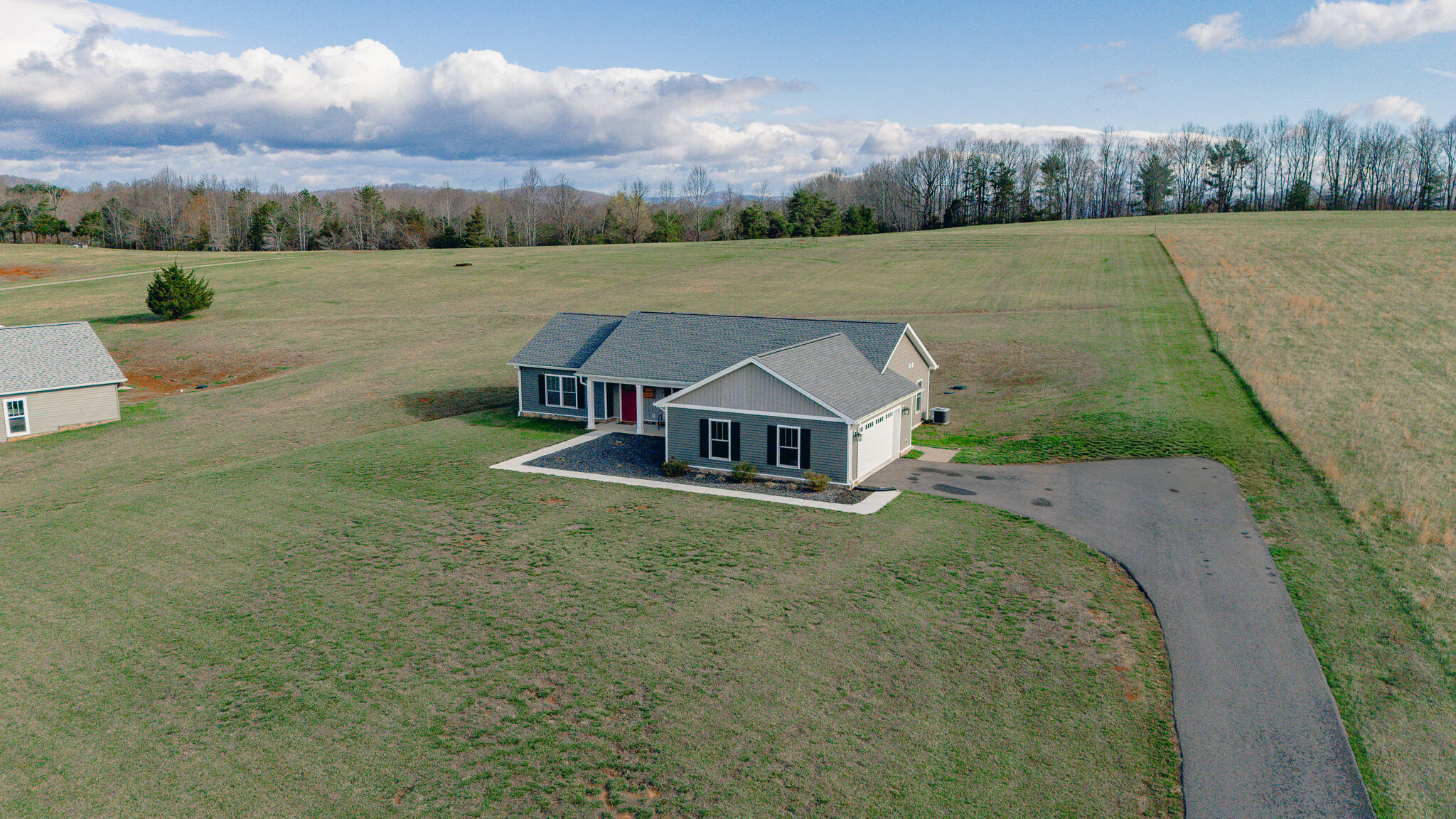 3546 Edwardsville Road Hardy, VA 24101 - Photo 23 of 29 an aerial view of a house with yard and lake view