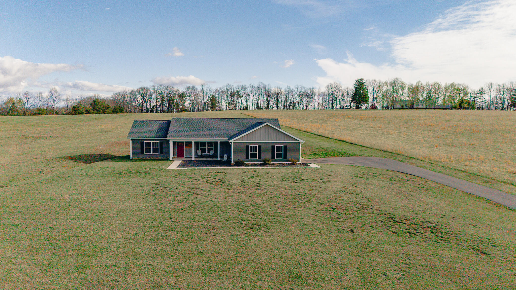 3546 Edwardsville Road Hardy, VA 24101 - Photo 24 of 29 a view of a lake with a house in the background