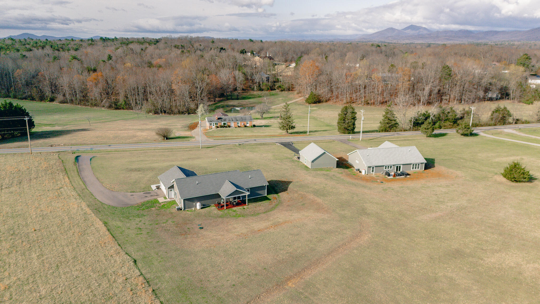 3546 Edwardsville Road Hardy, VA 24101 - Photo 27 of 29 an aerial view of a house with swimming pool and mountain view