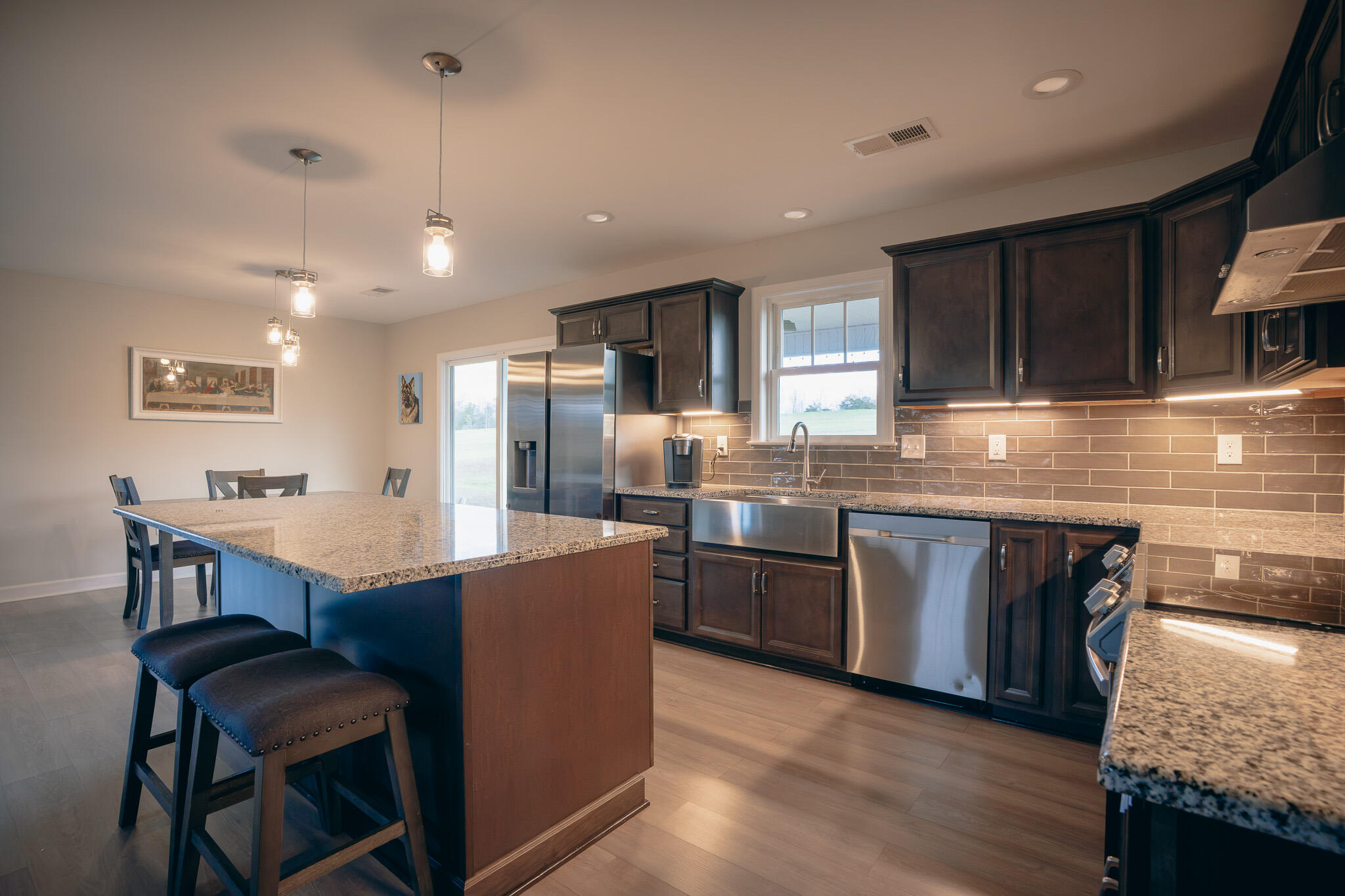 3546 Edwardsville Road Hardy, VA 24101 - Photo 6 of 29 a kitchen with stainless steel appliances granite countertop wooden cabinets a sink a stove a refrigerator and island