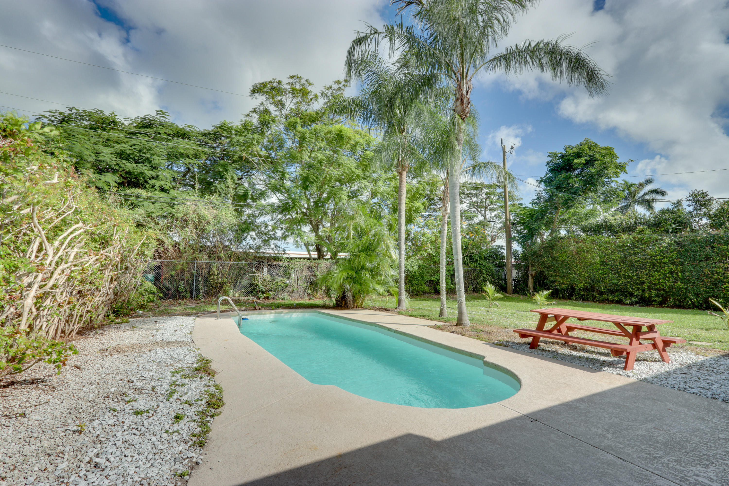 336 Mid Pines Road Palm Springs, FL 33461 - Photo 27 of 40 Pool/Backyard