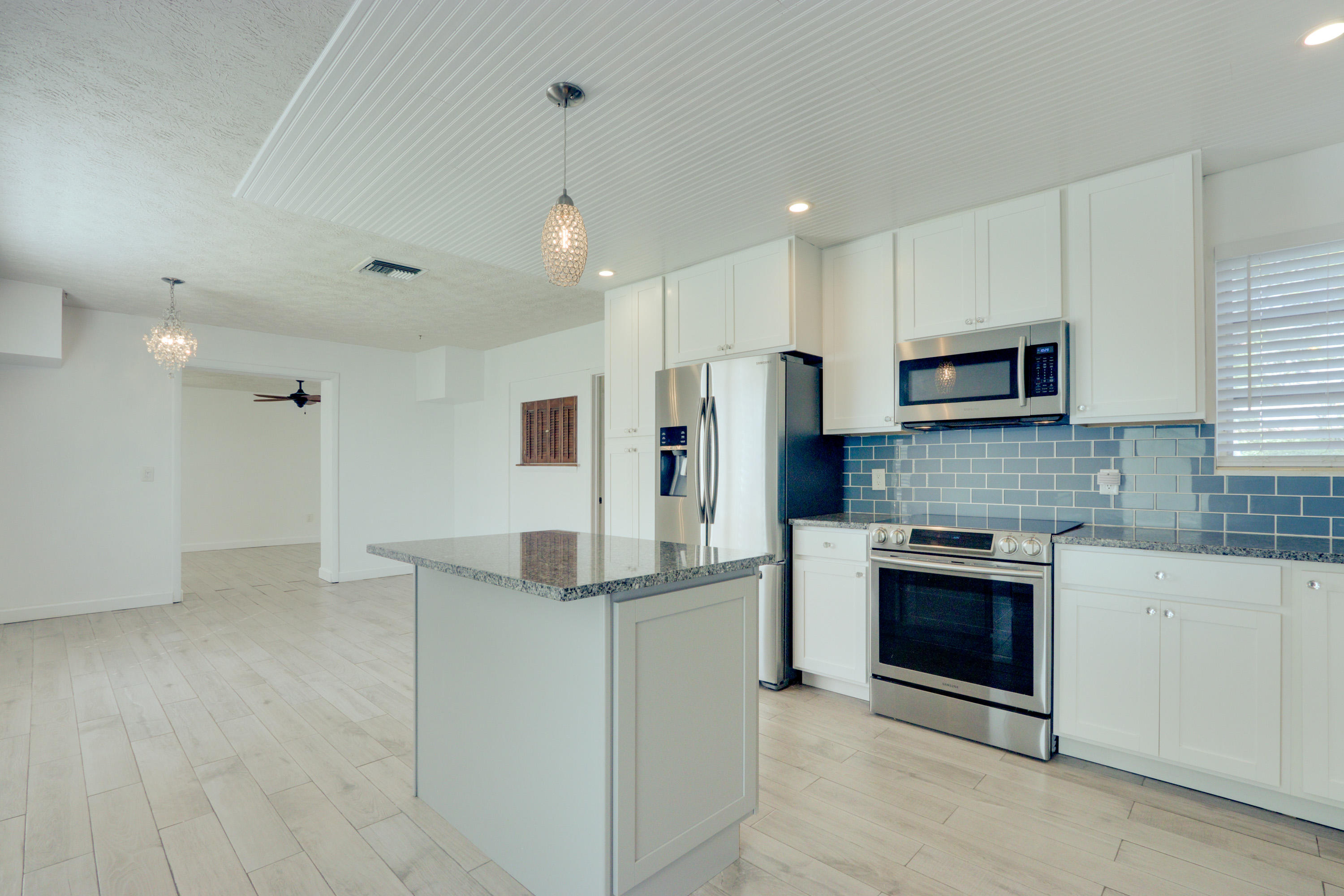 336 Mid Pines Road Palm Springs, FL 33461 - Photo 8 of 40 Renovated Kitchen