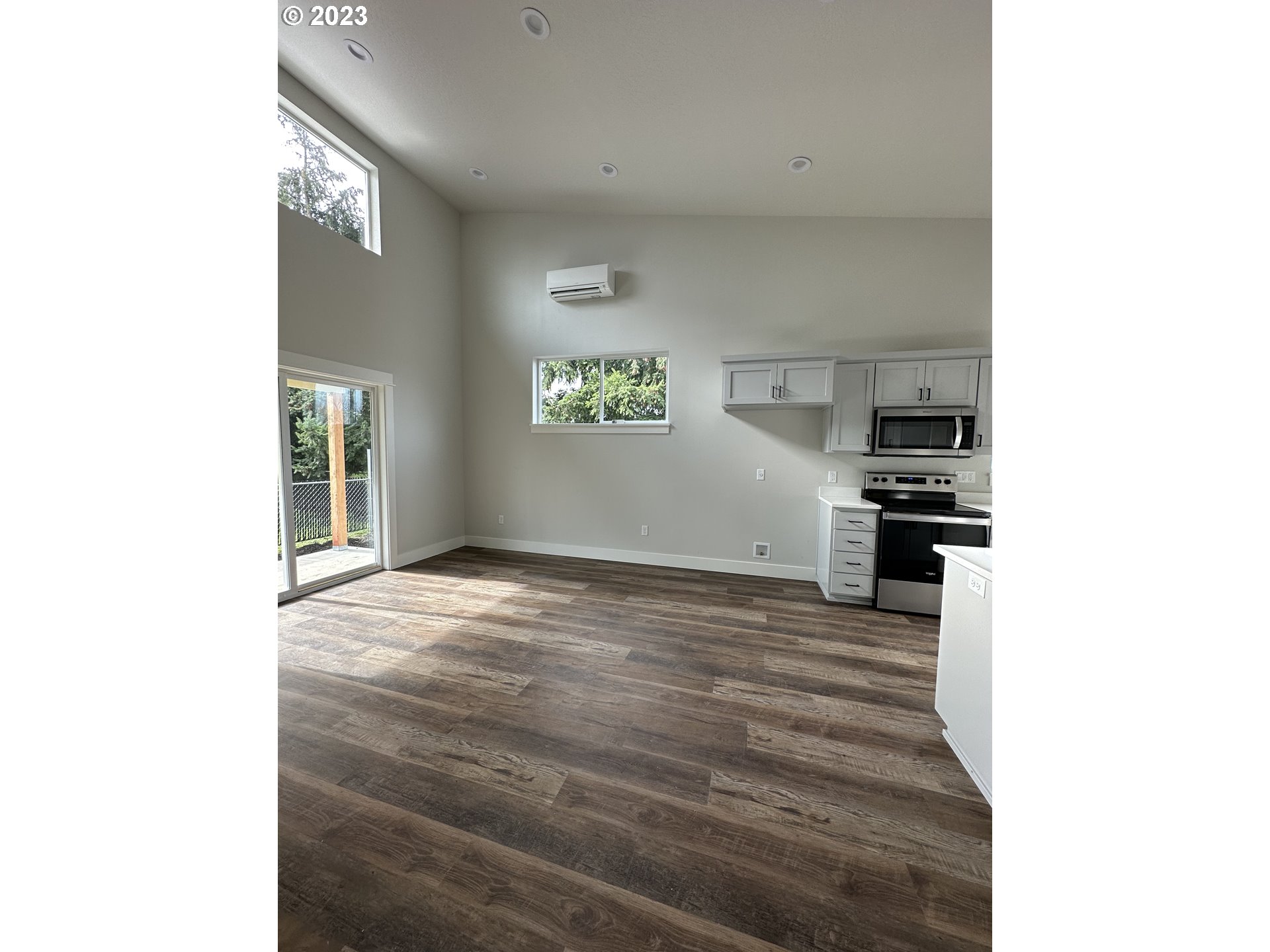 348 19th Springfield, OR 97477 - Photo 5 of 11 a view of a kitchen with microwave and cabinets