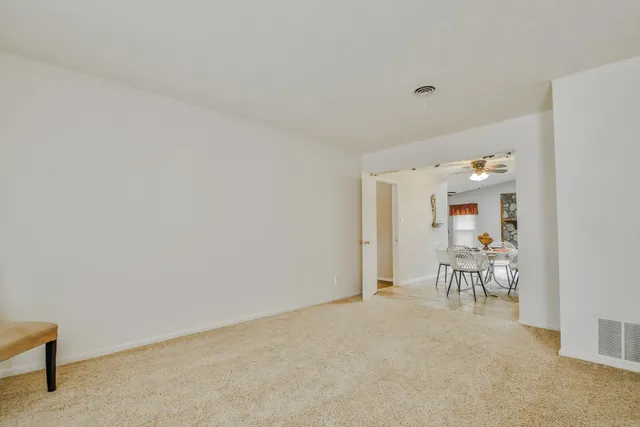 a view of a room and window