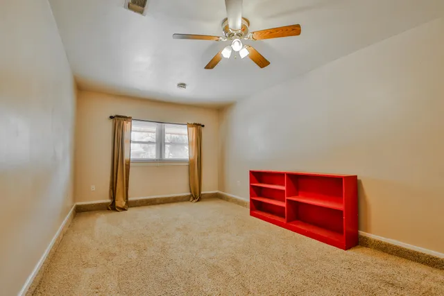 an empty room with window