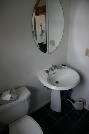 11 Cole Road Williamsburg, MA 01039 - Photo 25 of 30 a bathroom with a sink toilet and mirror