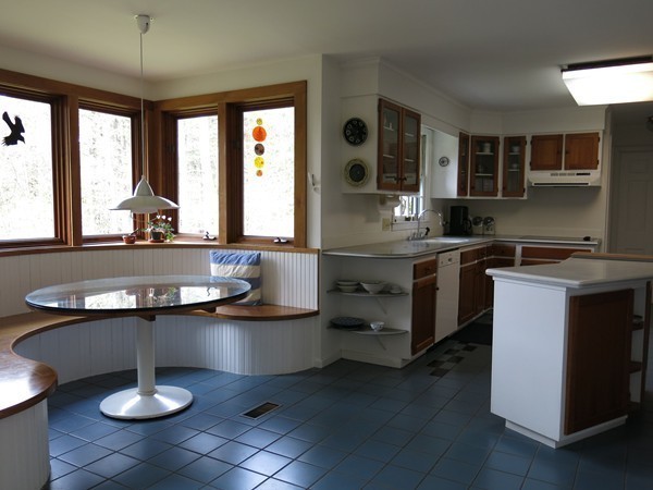 11 Cole Road Williamsburg, MA 01039 - Photo 9 of 30 a kitchen with a sink stove and cabinets