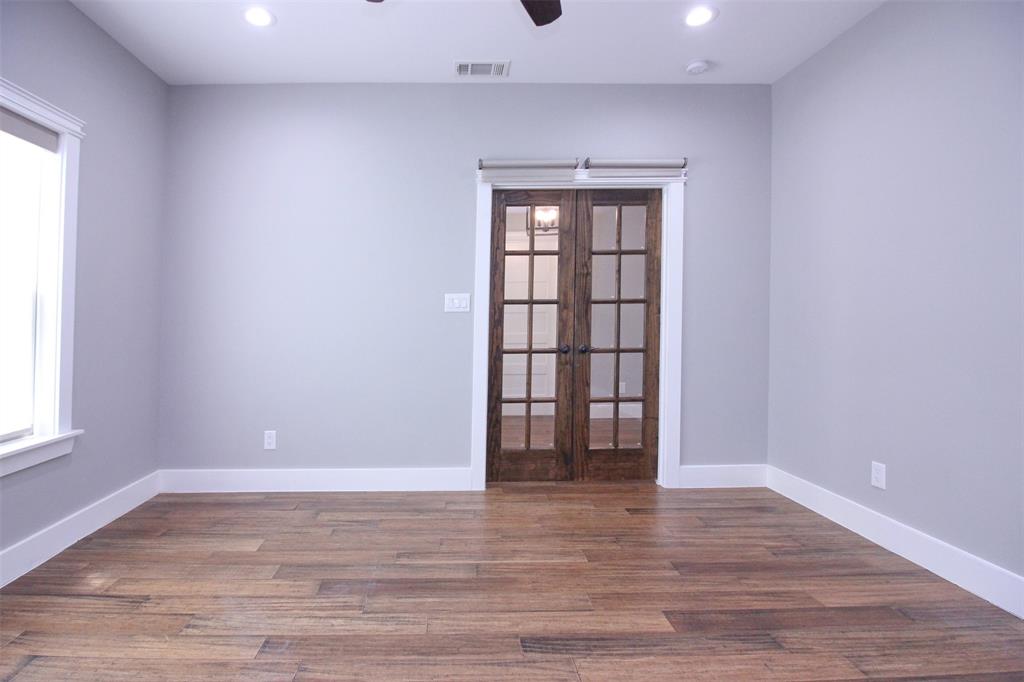 3238 Fm 2048 Boyd, TX 76023 - Photo 12 of 38 a view of an empty room with wooden floor and a window