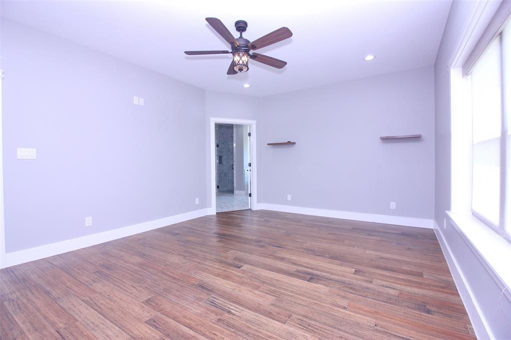 3238 Fm 2048 Boyd, TX 76023 - Photo 18 of 38 a view of an empty room with window and wooden floor