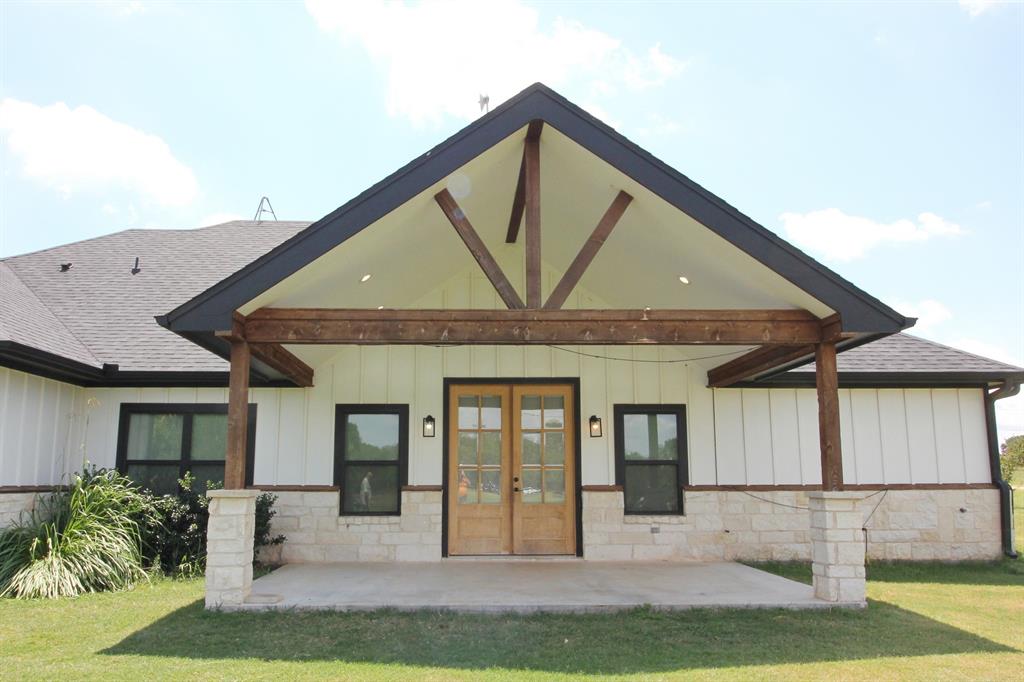3238 Fm 2048 Boyd, TX 76023 - Photo 31 of 38 a front view of a house with garden