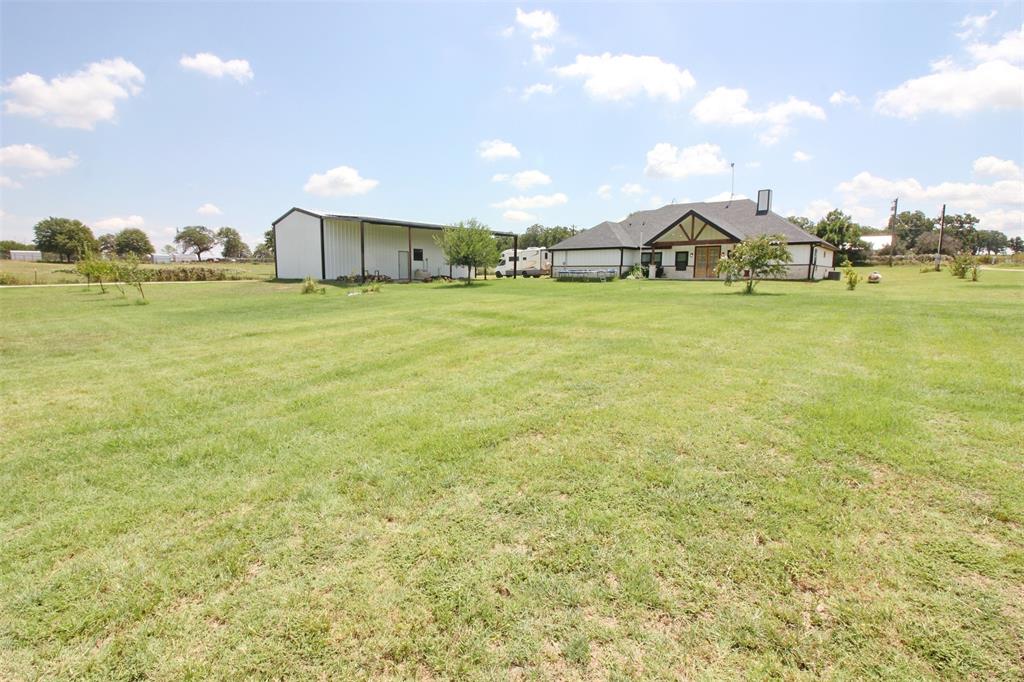 3238 Fm 2048 Boyd, TX 76023 - Photo 32 of 38 a house view with swimming pool outdoor seating and barbeque oven