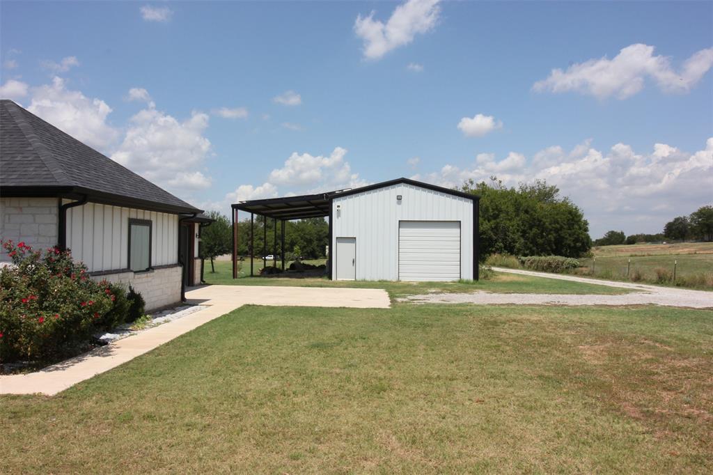 3238 Fm 2048 Boyd, TX 76023 - Photo 34 of 38 a view of a house with backyard and garden