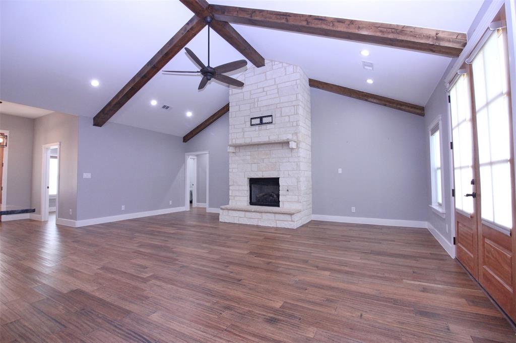 3238 Fm 2048 Boyd, TX 76023 - Photo 7 of 38 a view of an empty room with wooden floor and a window